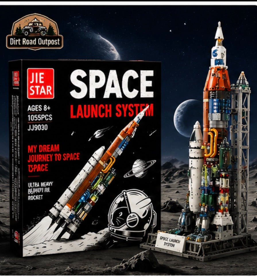 JIE STAR Space Launch System building block set shown with its retail box on the left and the assembled model rocket on the right, set against a space-themed background with planets and a moon.