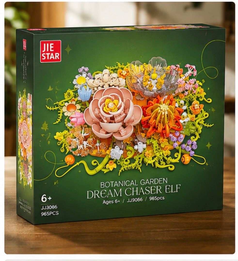 JIE STAR Botanical Garden Dream Chaser Elf building kit box, featuring a dark green background with a colorful 3D floral illustration on the front, set on a wooden surface.