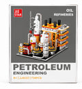 JIE STAR Oil Refineries building block set in its retail packaging, featuring a 734-piece model of an oil refinery with white, orange, and silver blocks on a gray background.