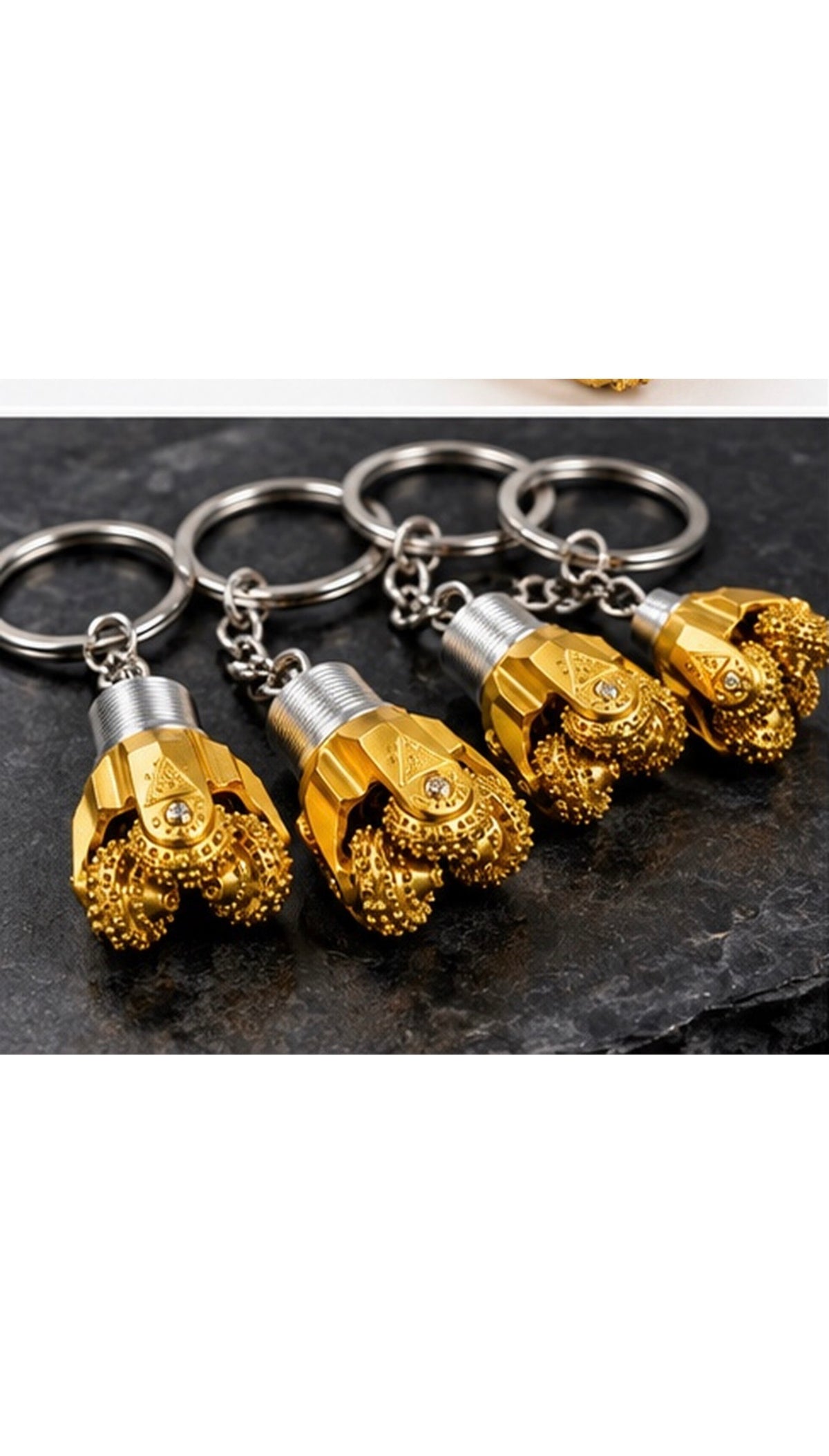 Oilfield Drill Bit Keychain – Rotating Roller Cone Design