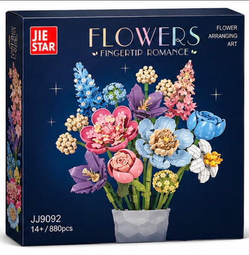 JIE STAR 'Flowers Fingertip Romance' building block set in a dark navy blue box, featuring a colorful illustration of assembled flower arrangements in a gray pot.