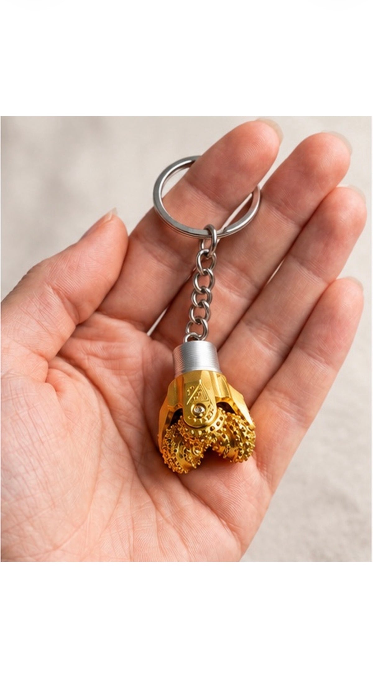 Oilfield Drill Bit Keychain – Rotating Roller Cone Design