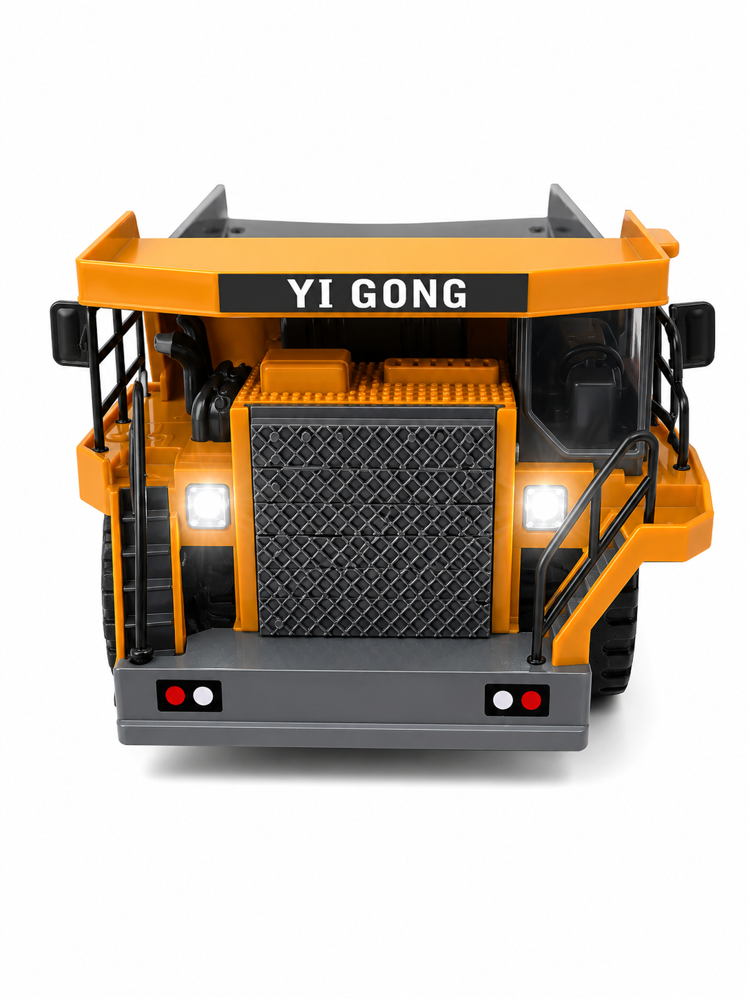 A toy dump truck with a bright orange body, black grille and wheels, and a gray front bumper. The words 'YI GONG' are printed on a black strip above the grille.